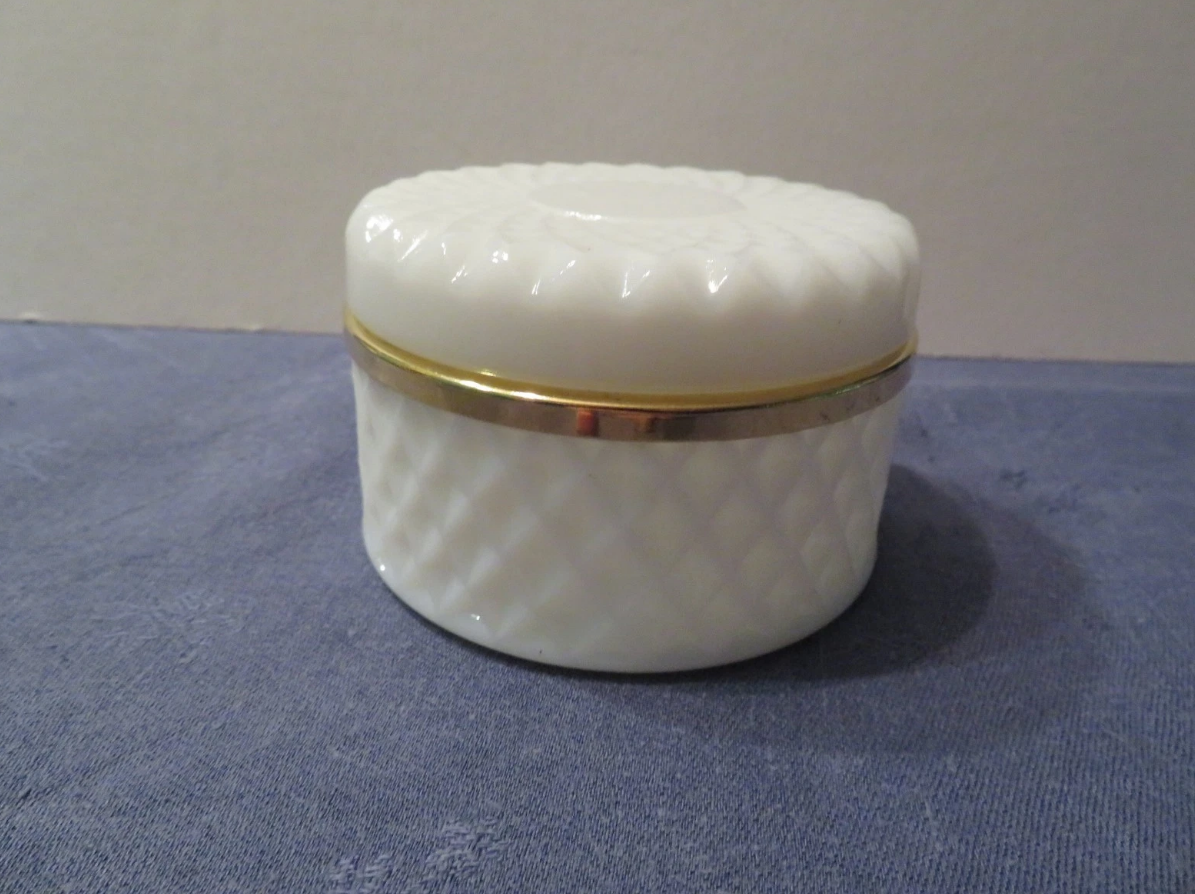 old white opaline box and brass strapping-